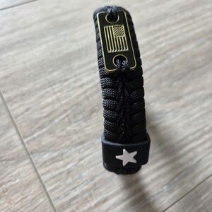 Black Paracord Bracelet with Gold and Silver Accents. Adjustable Length